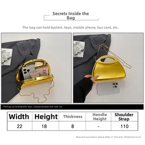 Size chart showing dimensions for the gold acrylic clutch bag with chain strap