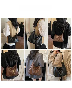 Detail view of vintage large capacity tote bag with stylish chain strap for women