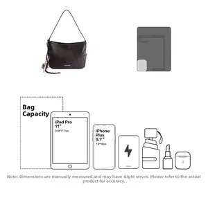 Detail view of brown leather bag capacity showing iPad, phone, and daily essentials