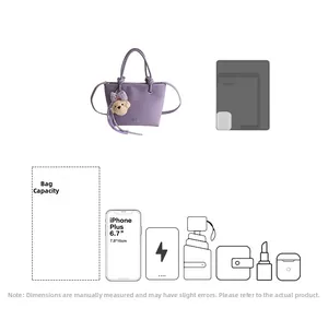 Detail showing internal capacity of purple bucket bag with plush bear charm