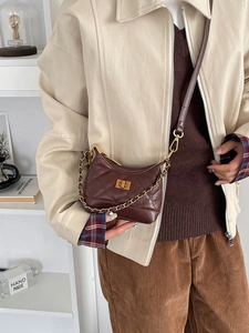 Chic dark brown quilted square bag with gold chain strap and vintage twist lock