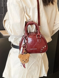 Elegant wine red leather bowling handbag with bear charm and silk scarf for women