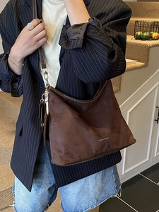 Vintage dark brown faux suede tote bag with slim straps and polished metal hardware