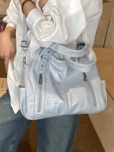 Grand sac cabas bleu clair avec fermetures éclair et bandoulière réglable pratique