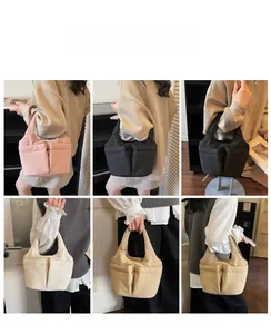 Quilted bucket bag with multiple pockets shown in various colors on a model