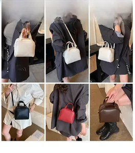 Detailed views of women vintage square bag in white black red and brown leather