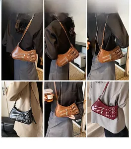 Detail showing vintage multi-pocket shoulder bag with metal buckles in three colors