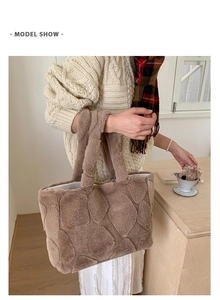 Detail view of coffee plush tote bag featuring luxury faux fur and diamond grid texture