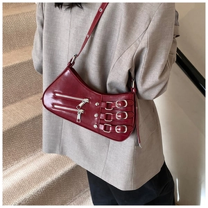 Retro burgundy shoulder bag with metallic zippers and asymmetric silhouette for women