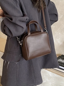 Minimalist dark brown leather crossbody handbag for women with dual top handles