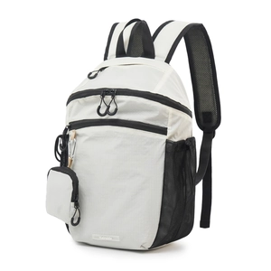 Detail of lightweight white checkered nylon backpack with side mesh pocket and mini pouch