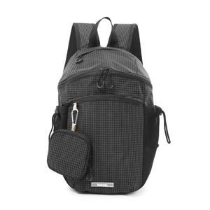 Detail of black checkered nylon backpack with detachable pouch and mesh side pockets