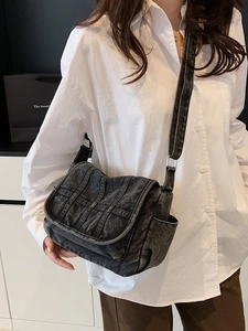 Retro multi-pocket denim shoulder bag in washed grey with adjustable strap for women