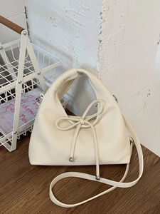 French retro creamy white leather handbag with bow detail and adjustable shoulder strap