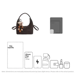 Detailansicht der Kapazität dieser braunen Handtasche für Handy, Geldbörse und Make-up