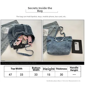 Detailed size chart showing dimensions of the large capacity washed denim tote bag