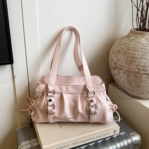 Pink pleated PU leather shoulder bag with silver buckle and side bow accents
