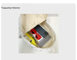 Detailed view of the spacious inner compartment of the backpack showing storage capacity