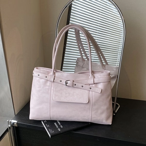Pink faux leather tote bag with silver buckle strap and large capacity design