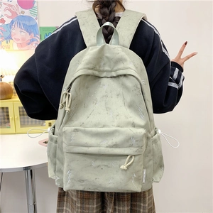 Green marble print school backpack with lightning pattern for students and travel