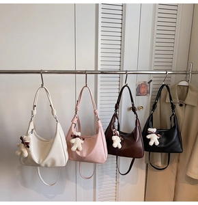 Collection of large leather hobo bags in four colors with cute teddy bear charms