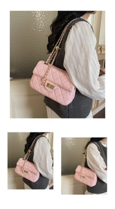 Detail of pink quilted shoulder bag featuring classic golden chain and rectangular turn-lock
