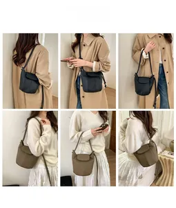 Molteplici viste di una borsa a secchiello in pelle a zucca nei colori nero e caffè