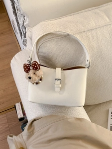 Minimalist white leather bucket shoulder bag with silver buckle and cute bear charm