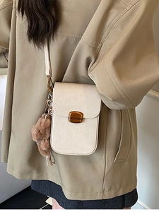 Minimalist beige crossbody phone bag with vintage pleated texture and cute bear charm