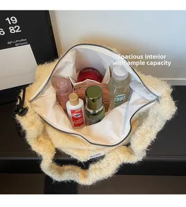 Macro shot of large capacity faux fur tote bag interior showing inner lining and zipper