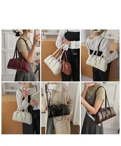 Detailed views of vintage Boston style underarm bags in burgundy, cream, brown and black