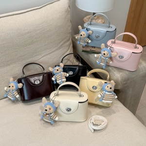 Detailed collection of mini crossbody box bags in six colors with teddy bear charms
