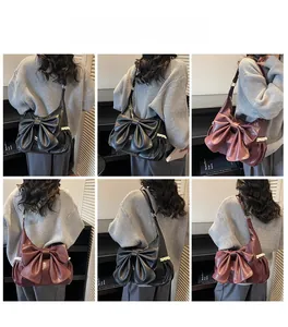 Multiple views showing bow shoulder bag with lace pockets in black and burgundy