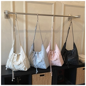 Chic punk style studded leather crossbody bags in white blue pink and black colors