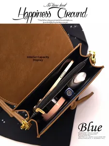 Internal capacity of brown faux leather crossbody bag with multiple storage compartments