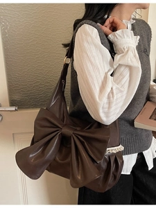 Vintage dark brown tote bag with large bow detail and lace trim for daily casual wear