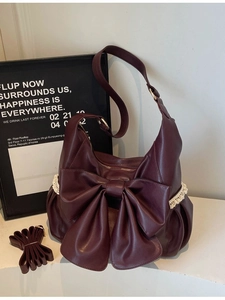 Retro burgundy hobo bag with large bow and white lace trim including two straps