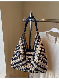 Handmade crochet hobo tote bag with geometric floral weave and navy leather handles