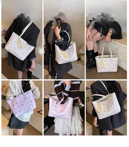 Detailed views of checkered tote bags with bow patterns and pearl charms for students