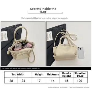 Tableau des dimensions détaillées pour ce sac seau élégant avec guide des tailles