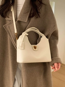 Elegante weiße Leder-Eimertasche mit Goldschloss und Tragegriff für Damenmode