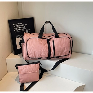 Pink large travel duffel bag and shoulder bag set made of water-resistant nylon