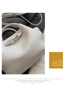 Détail du sac seau blanc en cuir grainé de qualité supérieure avec fermoir en argent chic