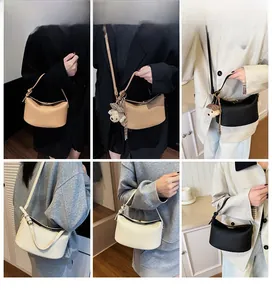 Detailed views of leather texture shoulder bag in brown, beige, black and white colors