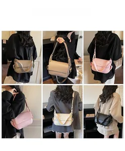 Detail view of crossbody messenger bags in four colors with textured leather and side pockets
