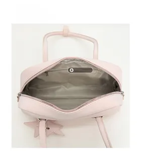 Top view of the interior compartment featuring a main pocket and a secure zipper pocket