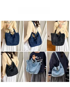 Detail view of denim tote bags in black and blue colors with adjustable shoulder straps