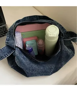 Macro top view of large capacity denim tote bag showing spacious inner storage space
