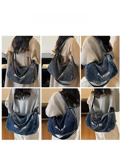 Multiple views of a blue denim tote bag with white REPLACED text worn by a model