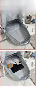 Vista interna dello zaino con scomparto imbottito per laptop e doppie tasche organizzative